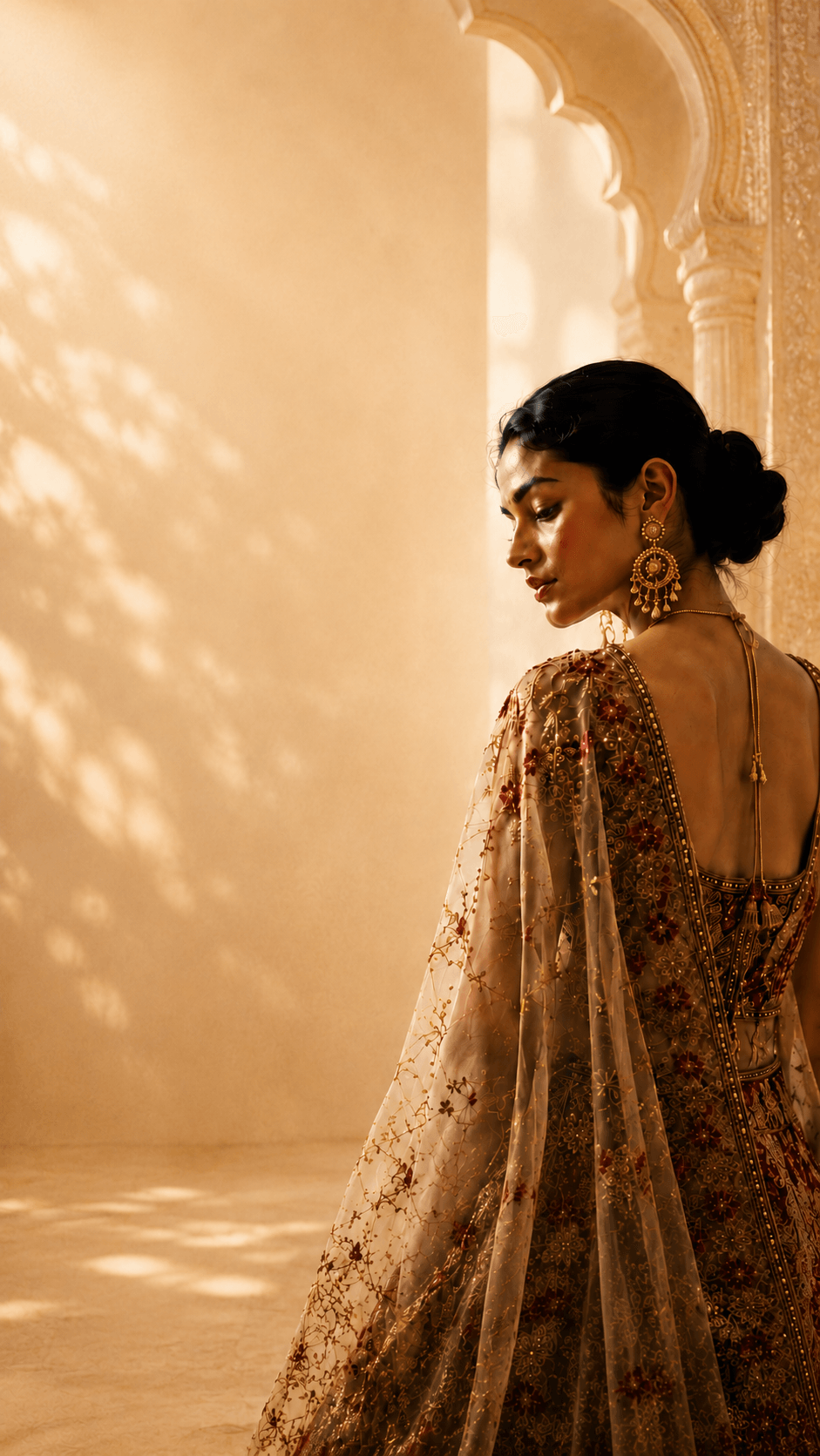Luxury VasthraShree mobile hero background with editorial model